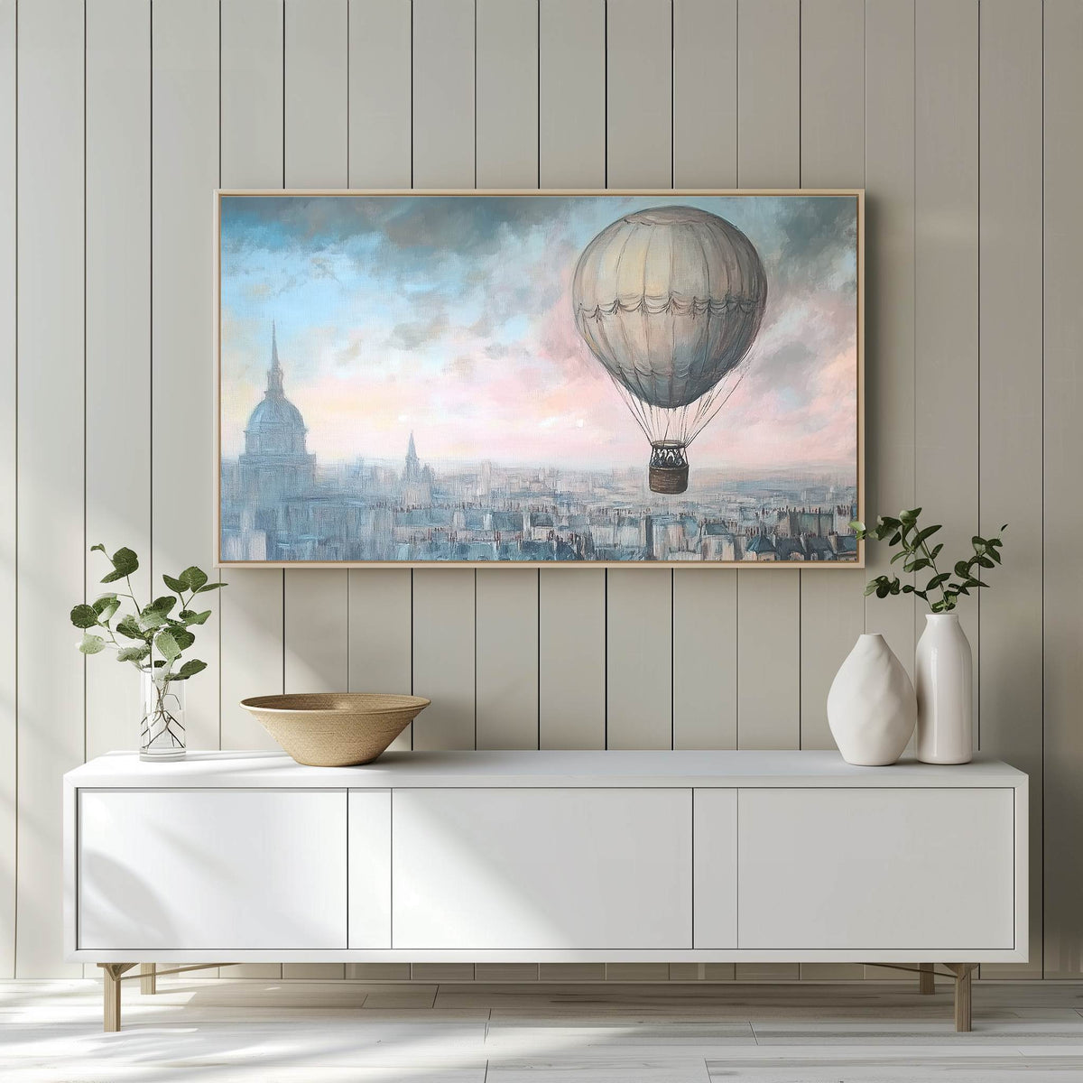 Pastel hot air balloon sketchy artwork on Samsung Frame TV above white entertainment center