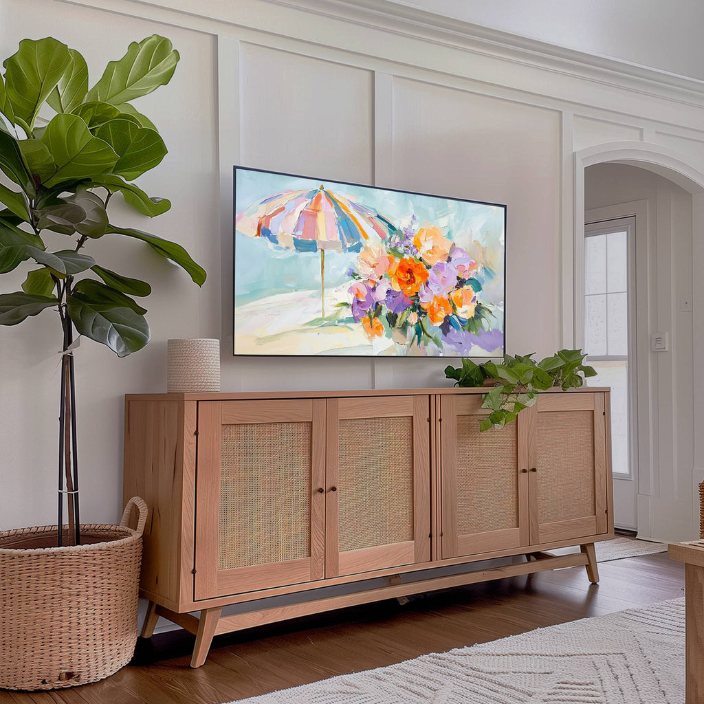 Pastel Beach Umbrella and Flowers on Samsung Frame TV in a modern living room with plants and natural light