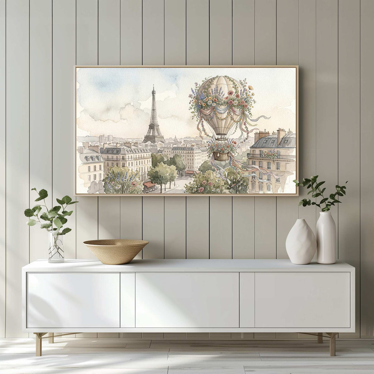 Samsung Frame TV displaying a romantic watercolor floral balloon Paris illustration above a white minimal entertainment center